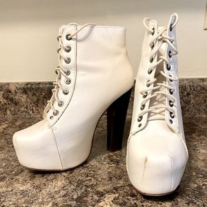 Delicacy platform heels. Worn maybe twice. Surprisingly comfortable.